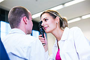 Doctor checking a patients eyes