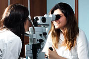 Woman having her eyes checked