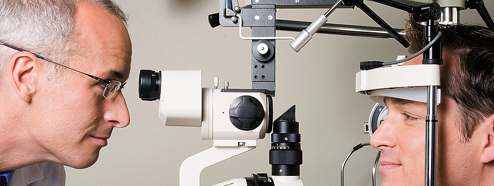 Man having an eye check up